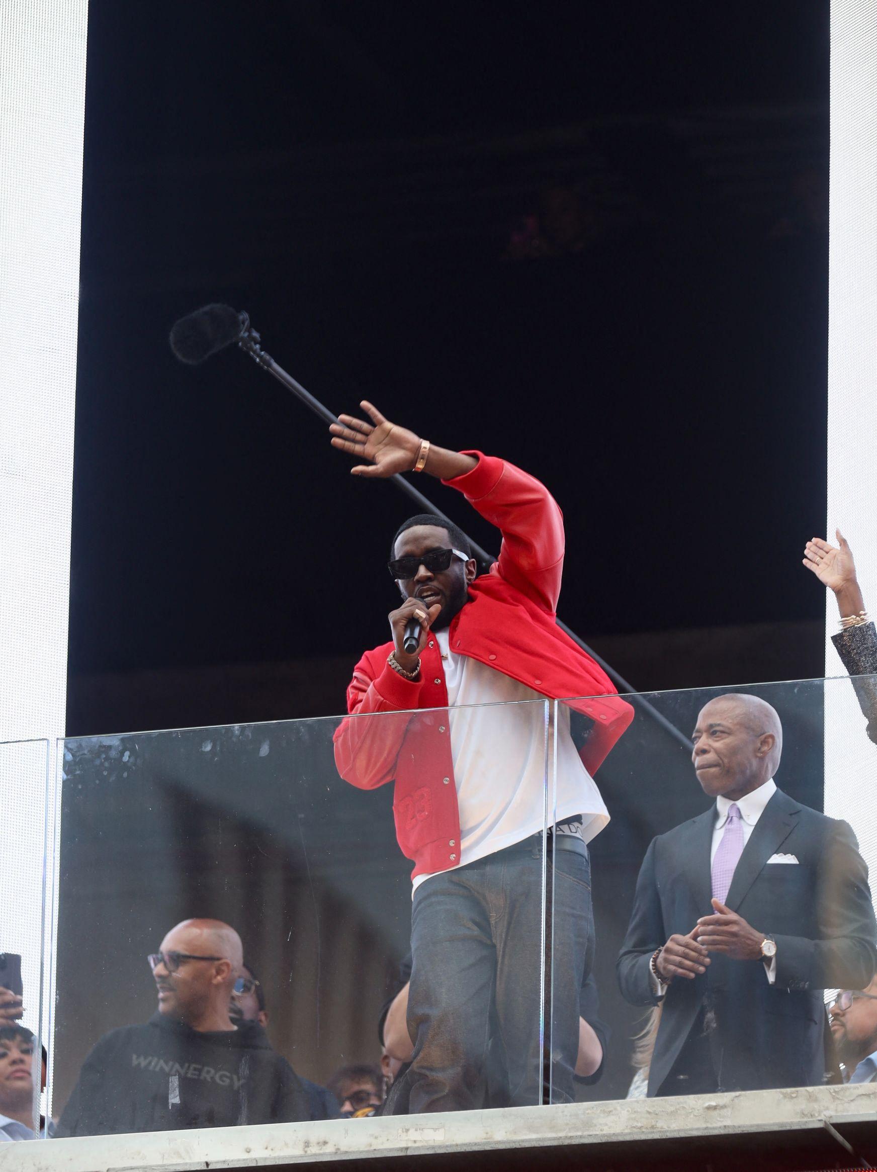 Mayor Eric Adams Awards Key to the City of New York to Sean Diddy Combs at VIP Space out in Times Square in New York.